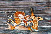 Bangkok Grand Palace, Ramakien murals of the gallery of the Wat Phra Kaew, Tosakan instructing Naang Suphanmacha to destroy the road. Detail of Hanuman is courting Naang Suphanmacha. 